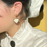 SANDRALEXANDRA Milagros White Heart Black Dot Earrings