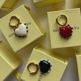 SANDRALEXANDRA Milagros White Heart Black Dot Earrings